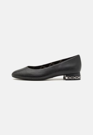 Black leather ballet flats with a rounded toe, low block heel featuring a silver chain accent, and a smooth finish.