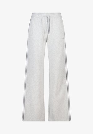 Pantalon de survêtement gris clair avec taille élastique et cordon de serrage. Caractéristiques : bandes latérales de couleur foncée, jambes larges et texture de tissu douce.