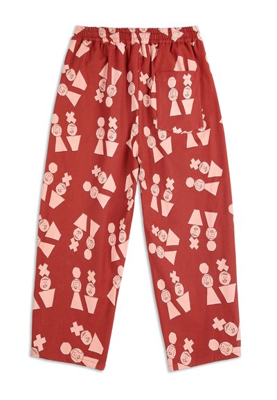 Nohavice s elastickým pásom v rustikovej farbe s vzorom abstraktných ružových tvárí a geometrických tvarov, s bočnou kapsou na pravej strane.