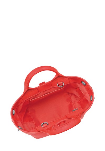 Bright red leather handbag with two handles, open top showing spacious interior and metal ring attachments inside.