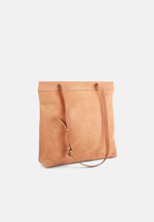 Tan leather tote bag with two sturdy shoulder straps, flat rectangular shape, minimalistic design, and a subtle embossed logo on the front.