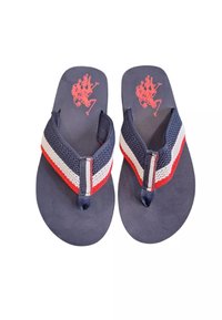 Infradito navy con cinturino intrecciato rosso e bianco. Soletta imbottita morbida, suola in gomma testurizzata, con logo rosso.