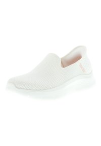 Scarpa bianca senza lacci con tomaia in rete, superficie testurizzata e fodera morbida. Caratterizzata da una suola in gomma con un leggero sistema di ammortizzazione e un branding minimo.