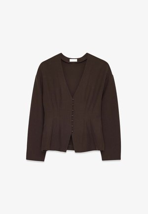 Ruda, ilgomis rankovėmis palaidinė su V formos iškirpte ir sagomis priekyje. Lygi tekstūra, priderintas dizainas ir subtilios vertikalios raukšlės.