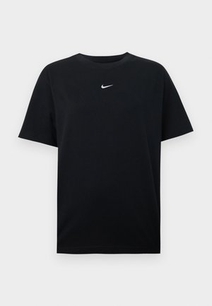 Svart bomulls-T-shirt med rund halsringning och korta ärmar. Har en liten vit Nike-logotyp centrerad på bröstet. Mjuk textur.