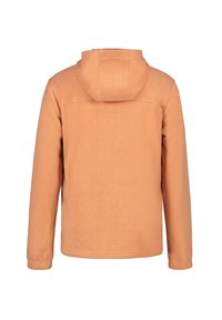 Hættejakke i blødt orange stof med en tekstureret overflade og lange ærmer. Bagsiden er ensfarvet uden synligt udstyr eller detaljer.