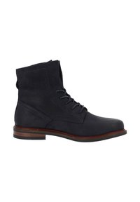 Stivaletto alla caviglia in pelle blu scuro con lacci, cuciture rinforzate e suola impilata marrone con grip nero sul tacco.