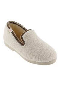 Pantofole slip-on color crema con esterno in pile testurizzato, bordo in filato marrone attorno all'apertura e suola beige.