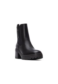 Stivale alla caviglia in pelle nera con tacco spesso, pannelli elastici laterali, suola testurizzata e dettagli di cucitura discreti. Adatto per un look casual.