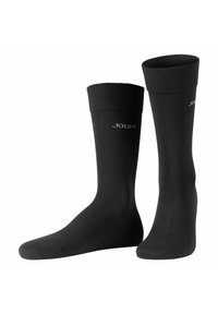 Calcetines de algodón negros con puño acanalado, que presentan un sutil logotipo plateado. Textura suave, longitud estándar y diseño minimalista.