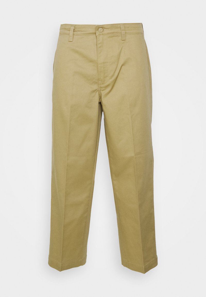 Chino beige con frontale piatto, design a gamba dritta, chiusura con bottone e tasche laterali. Realizzati in un tessuto misto cotone liscio e resistente.