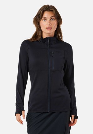 Black long-sleeve jacket with high collar, front zipper, and a zippered chest pocket. Features textured material and thumbholes in cuffs.