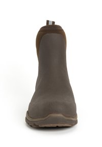 Brown rubber ankle boot with a smooth texture, rounded toe, and subtle stitching. Features a pull tab for easy wear.