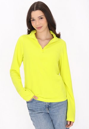 Helles, gelbes Langarm-Pullover mit einem halben Reißverschlusskragen, aus weichem Material, das einen lockeren Schnitt und leichten Stretch bietet.