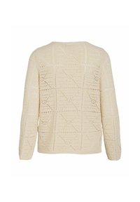 Suéter de ganchillo en color crema, con patrones geométricos y un corte holgado, con mangas largas y un cuello redondeado.