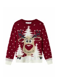 Pull pour enfant rouge avec un visage de renne souriant, des sapins de Noël blancs et de petits motifs d'étoiles sur les manches et le corps.