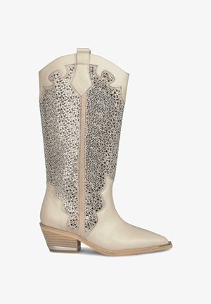 - Kowbojki i obuwie motocyklowe