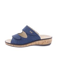 Blue slip-on sandal with textured upper, open toe, two adjustable straps, and a cork-like wedge sole. Features logo detail on the side.