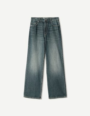 Wide-leg denim jeans in faded blue wash, featuring five pockets, a button fly, and subtle whiskering detail on the front.