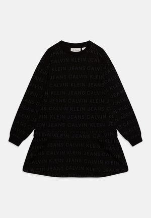 Sort langærmet kjole med gentaget "Calvin Klein Jeans" tekstmønster og rund halsudskæring.