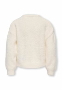 Kreemikas, pika varrukaga, karvane kootud kampsun soonikkoes mansettide ja äärega, kujutatud tagant valgel taustal.