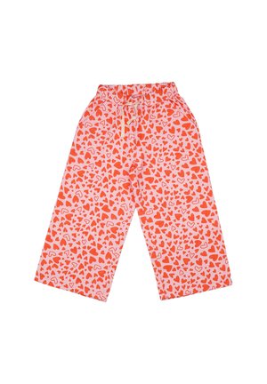 Pink wide-leg pants with elastic waistband and white drawstring, covered in various sizes of red heart patterns.