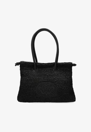 Sac fourre-tout tissé noir avec deux poignées robustes, présentant un design en relief proéminent sur le devant et une surface texturée.