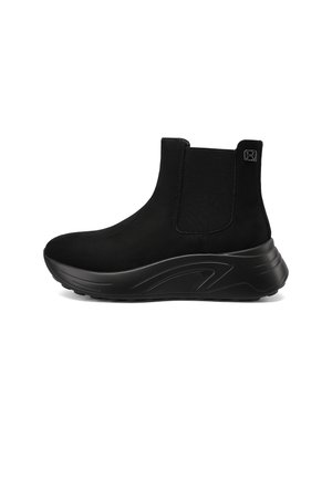 Stivaletto nero slip-on con pannelli laterali elastici e suola spessa e curva, progettato per un uso casual.
