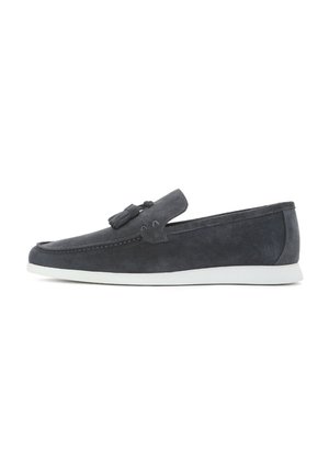 Dark blue suede loafers with tassel detail, white rubber sole, rounded toe, and stitching accents on the upper. Simple and sleek design.