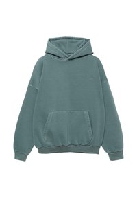 Sweat à capuche vert oversize avec poche kangourou à l’avant, manches longues et petit logo sur la poitrine.