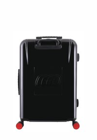 Black hard shell suitcase with a textured surface, embossed LEGO logo, retractable handle, and red wheels.