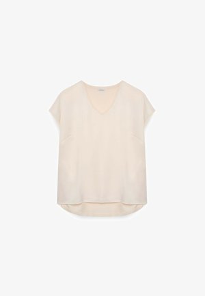 Bluza cu mânecă scurtă și decolteu în V, de culoare bej deschis, confecționată dintr-un material neted. Prezintă o croială lejeră și două buzunare frontale, cu un tiv rotunjit.