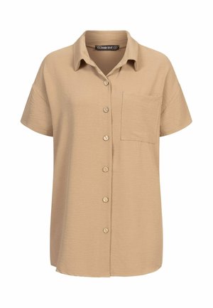 Chemise à manches courtes, beige, en tissu doux, avec un col et une poche avant unique avec des boutons assortis.