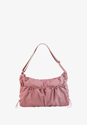 Pink fabric shoulder bag with a gathered design, featuring two front pockets, adjustable strap, and subtle brand tag. Smooth texture.