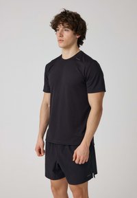 SNOCKS T-shirt basic - schwarz