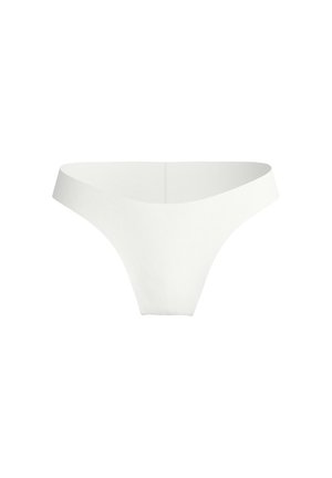 String blanc en tissu doux et extensible, avec une ceinture lisse et une conception sans coutures pour un confort optimal.