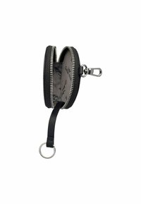 Porte-monnaie en cuir noir avec une surface texturée, fermeture éclair en métal argenté, deux compartiments et une boucle pour attacher un porte-clés. L'intérieur présente un revêtement à motifs.