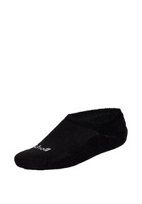 Calzino nero alla caviglia con un design texturizzato. Realizzato in un materiale leggero, presenta una vestibilità aderente e punta rinforzata. Il logo del marchio è visibile.