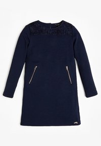 Laivastonsininen pitkähihaisen mekon teksturoitu kukkakuosi, pyöreä pääntie ja kaksi vetoketjulla varustettua taskua. Yläosassa pitsikoristelu.