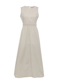 Robe sans manches beige clair avec une taille cintrée et des détails froncés, dotée d'un dos en trou de serrure et d'une jupe fluide. Matière en coton doux.