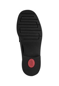 Semelle de chaussure noire avec motif rainuré, taille 37 indiquée, et une zone ovale rouge près du talon étiquetée "Tamaris Comfort".