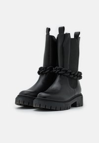 Marco Tozzi BY GUIDO MARIA KRETSCHMER - Botas con plataforma - black