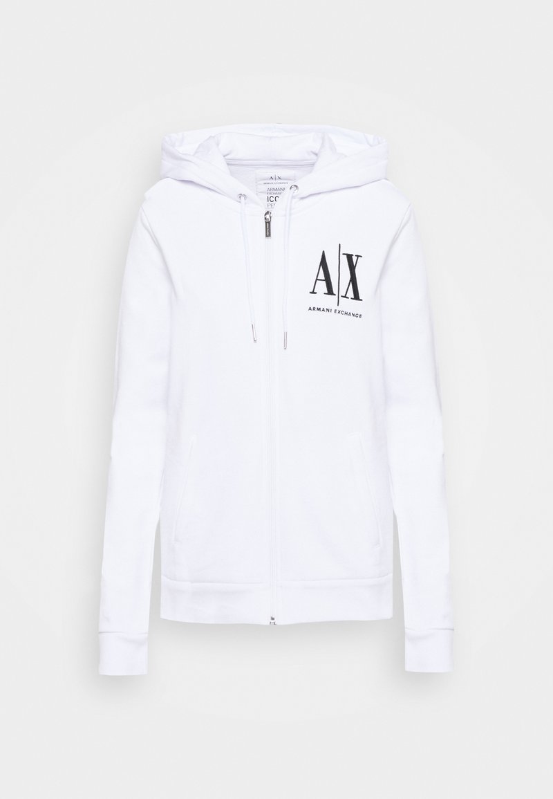 Felpa bianca con zip realizzata in un tessuto morbido, dotata di cappuccio, due tasche laterali e un logo nero di Armani Exchange sulla parte sinistra del petto.