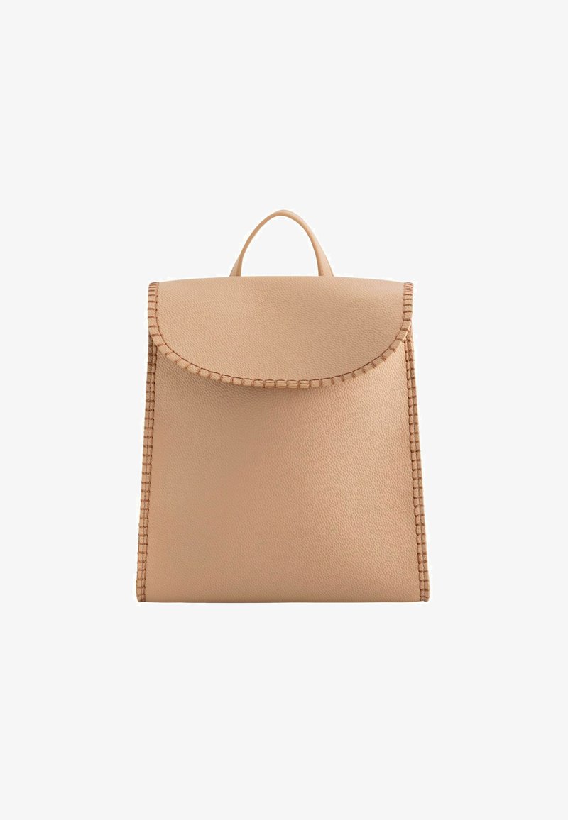 Beige leather backpack with a rounded flap, textured surface, and a decorative stitched edge. Features a top handle for easy carrying.