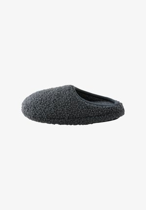 Pantofole in lana grigia con una superficie esterna texture, design slip-on, punta rotonda e fodera morbida. Nessun hardware o logo visibile.
