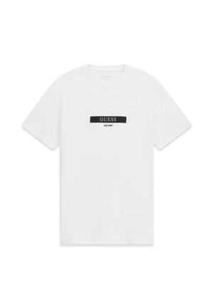 Bela bombažna majica s kratkimi rokavi in okroglim izrezom. Na njej se nahaja črn pravokoten logotip z besedilom "GUESS EST. 1981".