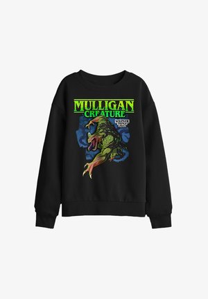 Black sweatshirt with green text "Mulligan Creature" and a large graphic of a green, clawed creature from Stranger Things Tales 85.