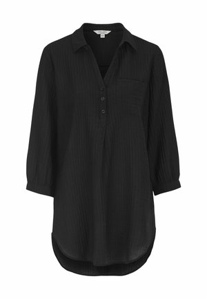 Schwarzes Hemd mit Knöpfen aus strukturiertem Stoff. Verfügt über einen Kragen, Dreiviertelärmel und eine Brusttasche. Abgerundeter Saum.