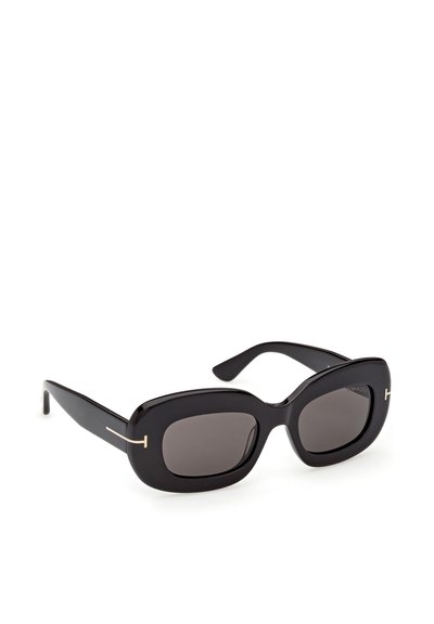 Lunettes de soleil rectangulaires surdimensionnées noires avec des montures épaisses et des verres teintés foncés, agrémentées de subtils accents dorés en forme de "T" sur les branches.