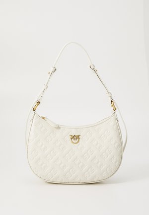 White leather handbag with embossed floral pattern, gold hardware detail, and adjustable shoulder strap. Semi-circular shape and smooth texture.